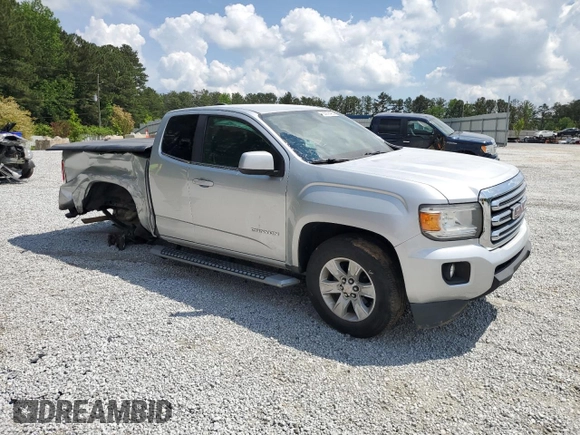 2016 GMC Canyon z VIN 1GTH5CE3XG1372815, wystawiony jako Copart lot #55076495 z przebiegiem 123 485 mil mil oraz Szkoda całkowita • Salvage title. Historia ofert i sprzedaży dostępna na DreamBid. Obrazek 4.
