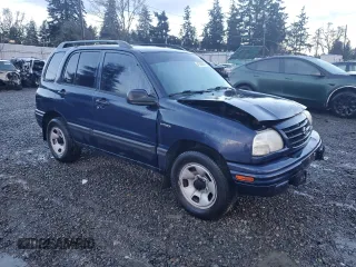 2001 Suzuki Vitara JX z VIN 2S3TD52V916109753, wystawiony jako Copart lot #41543965 z przebiegiem 102 720 mil mil oraz Szkody całkowita. Historia ofert i sprzedaży dostępna na DreamBid. Obrazek 4.