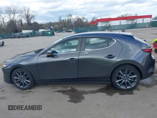 2020 Mazda 3 Preferred with VIN JM1BPBMM1L1169228, listed as a IAAI auction lot 41930452 with 31,351 mi miles and . Bid and sale history available at DreamBid. Image 14.