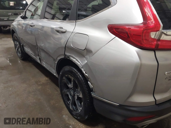 2017 Honda CR-V Touring with VIN 2HKRW2H90HH603307, listed as a IAAI auction lot 41868564 with 81,144 mi miles. Bid and sale history available at carsss.com. Image 18.
