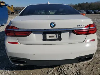 2016 BMW 7 Series 750i with VIN WBA7F0C56GGL99161, listed as a Copart auction lot 87652655 with 97,805 mi miles and Salvage Title. Bid and sale history available at carsss.com. Image 6.