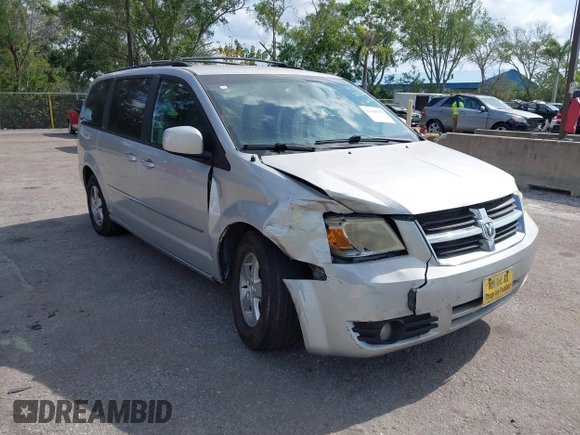 2010 Dodge Grand Caravan SXT with VIN 2D4RN5D15AR196651, listed as a IAAI auction lot 42105957 with 244,374 mi miles and . Bid and sale history available at DreamBid. Image 6.