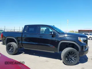 2021 GMC Sierra 1500 AT4 with VIN 3GTP9EED5MG206008, listed as a IAAI auction lot 41665423 with 61,685 mi miles. Bid and sale history available at carsss.com. Image 14.