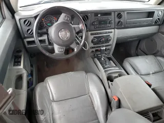 2007 Jeep Commander Sport z VIN 1J8HG48K97C598103, wystawiony jako Copart lot #65140225 z przebiegiem 204 638 mil mil oraz Czysty tytuł • Clean title. Historia ofert i sprzedaży dostępna na DreamBid. Obrazek 8.