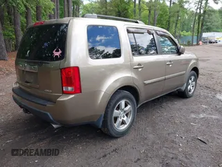 2009 Honda Pilot EX with VIN 5FNYF48409B041002, listed as a IAAI auction lot 42252034 with 116,938 mi miles and . Bid and sale history available at DreamBid. Image 4.