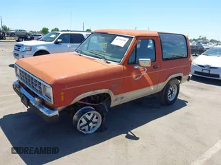 1987 Ford Bronco with VIN 1FMCU14T2HUB19762, listed as a IAAI auction lot 42336288 with 78,488 mi miles and . Bid and sale history available at DreamBid. Image 2.