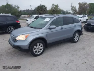 2009 Honda CR-V EX-L with VIN JHLRE387X9C006124, listed as a IAAI auction lot 41757092 with 142,038 mi miles. Bid and sale history available at carsss.com. Image 20.