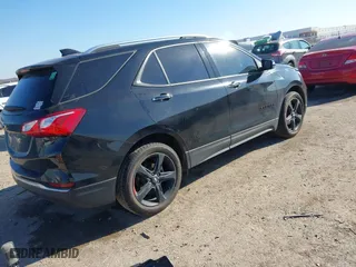 2021 Chevrolet Equinox Premier with VIN 2GNAXNEV2M6152500, listed as a IAAI auction lot 41140382 with 50,315 mi miles. Bid and sale history available at carsss.com. Image 4.