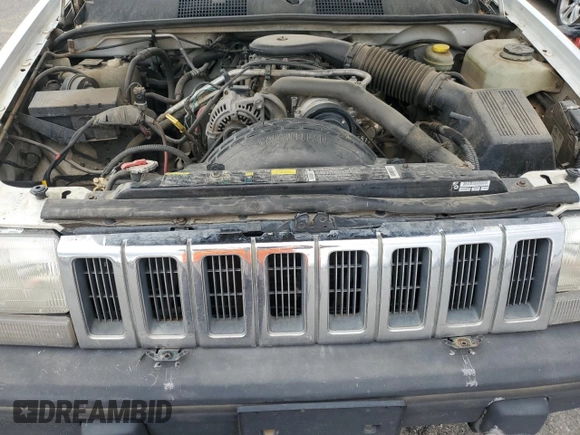 1995 Jeep Grand Cherokee Laredo with VIN 1J4GZ58Y6SC718918, listed as a Copart auction lot 72226394 with 212,670 mi miles and Salvage Title. Bid and sale history available at carsss.com. Image 11.