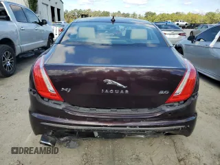 2013 Jaguar XJ z VIN SAJWA1C75D8V54004, wystawiony jako Copart lot #76922464 z przebiegiem 107 175 mil mil oraz Szkoda całkowita • Salvage title. Historia ofert i sprzedaży dostępna na DreamBid. Obrazek 6.