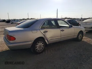 1998 Mercedes-Benz E-Class with VIN WDBJF65F1WA711193, listed as a Copart auction lot 76052034 with 168,935 mi miles and Salvage Title. Bid and sale history available at carsss.com. Image 3.
