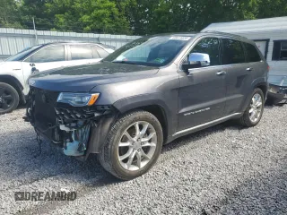 2014 Jeep Grand Cherokee Summit with VIN 1C4RJFJT4EC346946, listed as a Copart auction lot 60613025 with 50,565 mi miles and Salvage title. Bid and sale history available at DreamBid. Image 1.