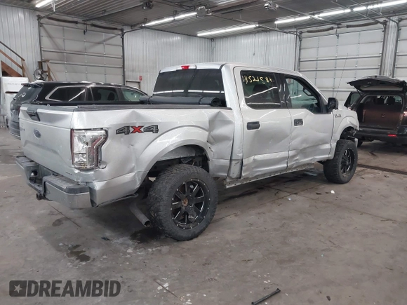 2015 Ford F-150 XLT with VIN 1FTEW1E89FFA44710, listed as a IAAI auction lot 41521584 with 158,297 mi miles. Bid and sale history available at carsss.com. Image 4.