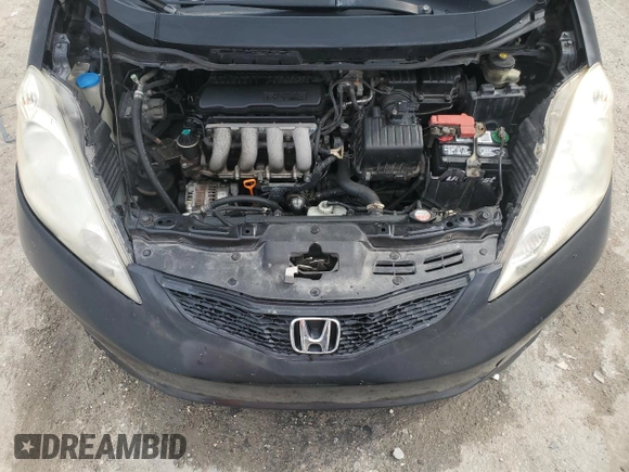 2009 Honda Fit Sport with VIN JHMGE88479S060797, listed as a Copart auction lot 54009135 with 167,914 mi miles and Salvage Title. Bid and sale history available at carsss.com. Image 11.