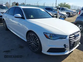 2018 Audi A6 Premium z VIN WAUC8AFC0JN086702, wystawiony jako IAAI lot #42022040 z przebiegiem 75 520 mil mil oraz . Historia ofert i sprzedaży dostępna na DreamBid. Obrazek 1.