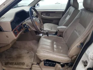 1998 Volvo S90 z VIN YV1KS9609W1140012, wystawiony jako Copart lot #69589044 z przebiegiem 175 864 mil mil oraz Szkoda całkowita • Salvage title. Historia ofert i sprzedaży dostępna na DreamBid. Obrazek 7.