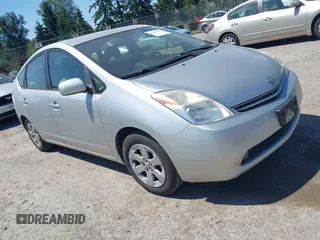 2005 Toyota Prius z VIN JTDKB20U557030059, wystawiony jako IAAI lot #42439520 z przebiegiem 135 423 mil mil oraz . Historia ofert i sprzedaży dostępna na DreamBid. Obrazek 1.