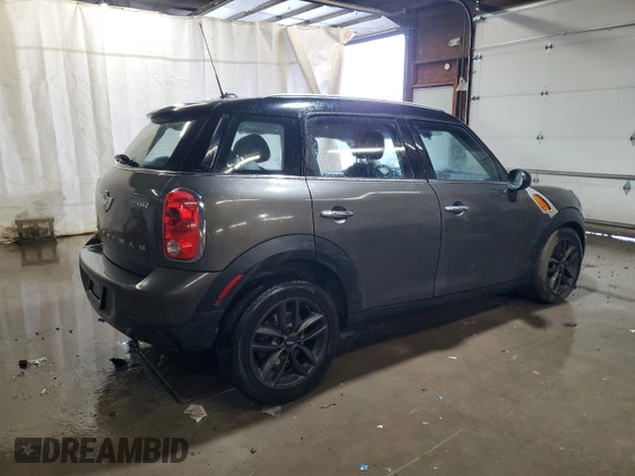 2014 MINI Countryman with VIN WMWZB3C59EWR42124, listed as a Copart auction lot 57830395 with 125,000 mi miles and Salvage title. Bid and sale history available at DreamBid. Image 3.