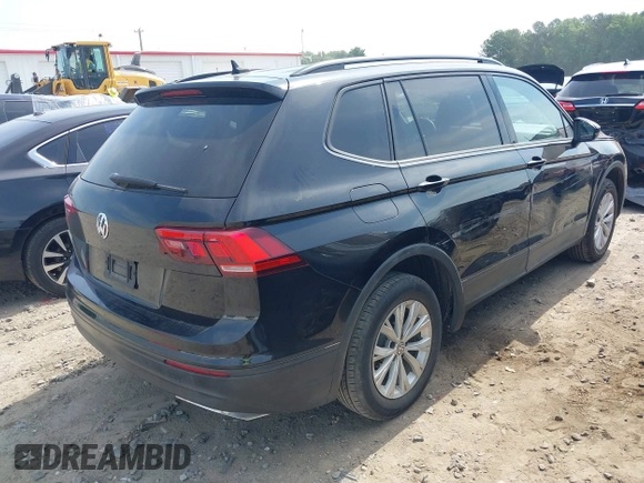 2020 Volkswagen Tiguan S with VIN 3VV1B7AX1LM086019, listed as a IAAI auction lot 42458434 with 114,413 mi miles and . Bid and sale history available at DreamBid. Image 4.