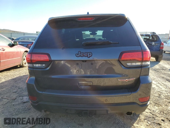 2021 Jeep Grand Cherokee Trailhawk with VIN 1C4RJFLG5MC627975, listed as a Copart auction lot 83080204 with 83,642 mi miles and Salvage Title. Bid and sale history available at carsss.com. Image 6.
