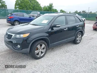 2013 Kia Sorento EX with VIN 5XYKU3A66DG331196, listed as a IAAI auction lot 42237451 with 139,250 mi miles and . Bid and sale history available at DreamBid. Image 2.