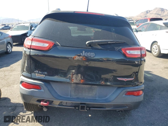 2015 Jeep Cherokee Trailhawk with VIN 1C4PJMBS8FW699319, listed as a Copart auction lot 61612245 with 173,581 mi miles and Clean title. Bid and sale history available at DreamBid. Image 6.