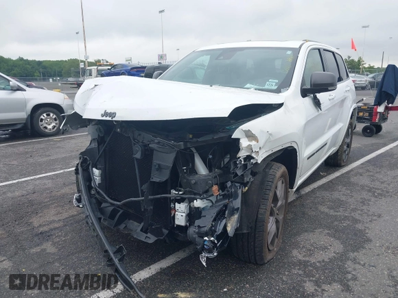 2021 Jeep Grand Cherokee 80th Anniversary with VIN 1C4RJFBG2MC568028, listed as a IAAI auction lot 42381104 with 51,027 mi miles and . Bid and sale history available at DreamBid. Image 17.