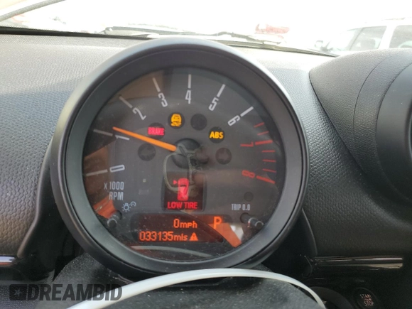 2015 MINI Countryman with VIN WMWZB3C55FWR46334, listed as a Copart auction lot 55421795 with 33,135 mi miles and Salvage Title. Bid and sale history available at DreamBid. Image 9.