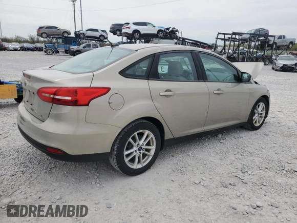 2016 Ford Focus SE z VIN 1FADP3F20GL267077, wystawiony jako Copart lot #53649665 z przebiegiem 106 329 mil mil oraz Szkoda całkowita • Salvage title. Historia ofert i sprzedaży dostępna na DreamBid. Obrazek 3.
