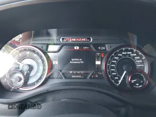 2019 Ram 1500 Rebel z VIN 1C6SRFLT2KN696557, wystawiony jako IAAI lot #42110931 z przebiegiem 81 372 mil mil oraz . Historia ofert i sprzedaży dostępna na DreamBid. Obrazek 7.