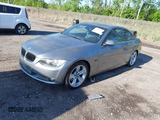 2007 BMW 3 Series 335i with VIN WBAWL73587PX49709, listed as a IAAI auction lot 41989465 with 147,255 mi miles. Bid and sale history available at carsss.com. Image 2.