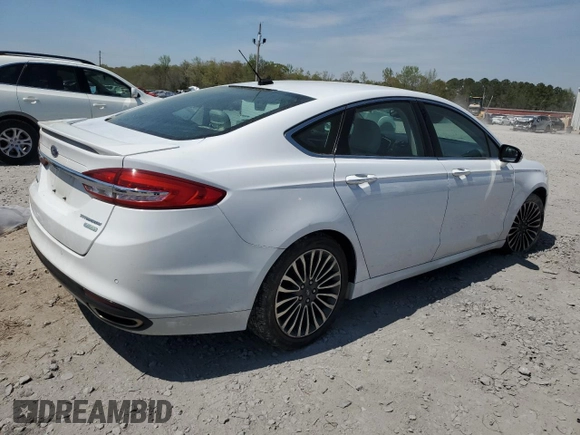2017 Ford Fusion Titanium with VIN 3FA6P0K97HR131672, listed as a Copart auction lot 50983715 with 123,666 mi miles and Salvage title. Bid and sale history available at DreamBid. Image 3.