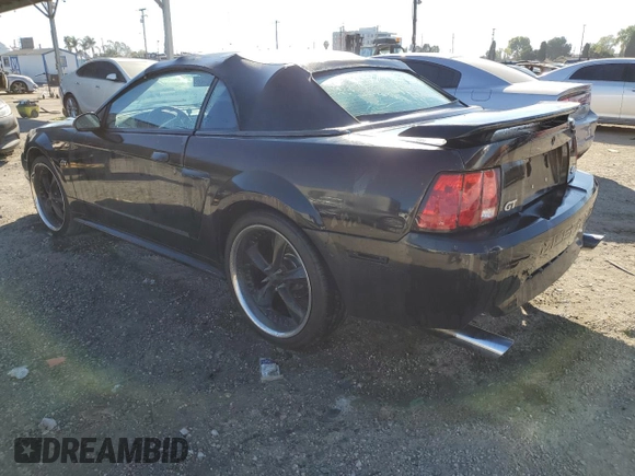 2001 Ford Mustang GT Deluxe with VIN 1FAFP45X51F165193, listed as a Copart auction lot 46522445 with 196,906 mi miles and Salvage Title. Bid and sale history available at carsss.com. Image 2.