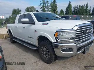 2021 Ram 2500 Longhorn z VIN 3C6UR5PL9MG578420, wystawiony jako IAAI lot #42780701 z przebiegiem 208 222 mil mil oraz . Historia ofert i sprzedaży dostępna na DreamBid. Obrazek 1.
