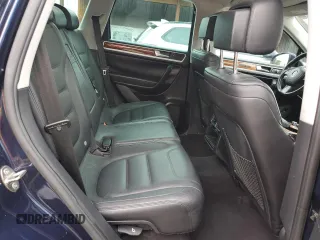 2011 Volkswagen Touareg Lux z VIN WVGFK9BP4BD001551, wystawiony jako Copart lot #58743065 z przebiegiem 142 661 mil mil oraz Szkoda całkowita • Salvage title. Historia ofert i sprzedaży dostępna na DreamBid. Obrazek 11.