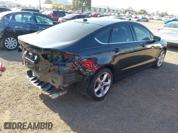 2014 Ford Fusion SE with VIN 3FA6P0HR7ER207927, listed as a IAAI auction lot 42094439 with 112,660 mi miles. Bid and sale history available at carsss.com. Image 4.