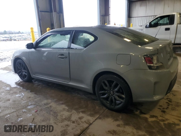 2014 Scion tC z VIN JTKJF5C7XE3071780, wystawiony jako Copart lot #47220975 z przebiegiem 102 630 mil mil oraz Szkody całkowita. Historia ofert i sprzedaży dostępna na DreamBid. Obrazek 2.