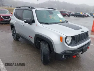 2017 Jeep Renegade Trailhawk z VIN ZACCJBCB5HPE50946, wystawiony jako IAAI lot #41719176 z przebiegiem 99 495 mil mil oraz . Historia ofert i sprzedaży dostępna na DreamBid. Obrazek 1.