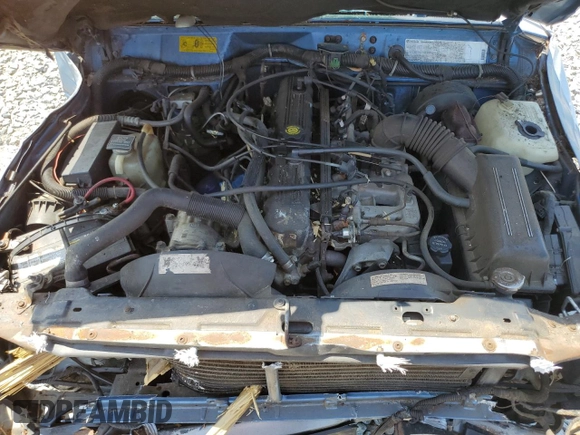 1991 Jeep Cherokee z VIN 1J4FJ58S0ML519252, wystawiony jako Copart lot #55458005 z przebiegiem 152 129 mil mil oraz Szkoda całkowita • Salvage title. Historia ofert i sprzedaży dostępna na DreamBid. Obrazek 11.