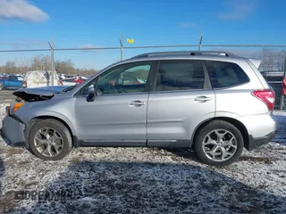 2016 Subaru Forester Touring z VIN JF2SJAXC4GH536085, wystawiony jako IAAI lot #41838081 z przebiegiem 155 930 mil mil oraz . Historia ofert i sprzedaży dostępna na DreamBid. Obrazek 14.
