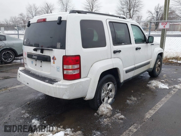 2011 Jeep Liberty Sport Jet with VIN 1J4PN2GK3BW587775, listed as a IAAI auction lot 41555089 with 126,921 mi miles and . Bid and sale history available at DreamBid. Image 4.