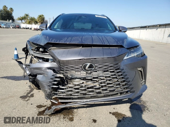 2023 Lexus RX with VIN 2T2BAMBA1PC010695, listed as a Copart auction lot 42902605 with 38,225 mi miles and Clean Title. Bid and sale history available at carsss.com. Image 5.