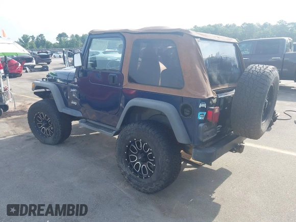 2002 Jeep Wrangler Sport with VIN 1J4FA49S72P729703, listed as a IAAI auction lot 42468446 with 164,342 mi miles and . Bid and sale history available at DreamBid. Image 3.