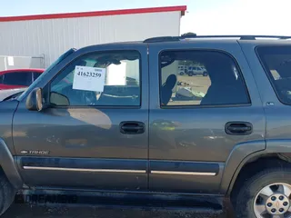 2002 Chevrolet Tahoe LT z VIN 1GNEC13Z42R319646, wystawiony jako IAAI lot #41623259 z przebiegiem 250 430 mil mil oraz . Historia ofert i sprzedaży dostępna na DreamBid. Obrazek 15.