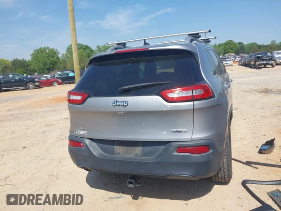 2015 Jeep Cherokee Latitude with VIN 1C4PJMCB6FW691816, listed as a IAAI auction lot 42026070 with 179,054 mi miles and . Bid and sale history available at DreamBid. Image 16.