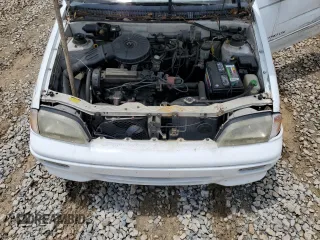 1993 Geo Metro z VIN JG1MR3362PK209644, wystawiony jako Copart lot #58749655 z przebiegiem 149 163 mil mil oraz Szkoda całkowita • Salvage title. Historia ofert i sprzedaży dostępna na DreamBid. Obrazek 11.
