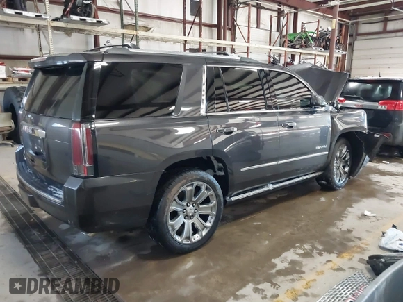 2016 GMC Yukon Denali with VIN 1GKS2CKJ8GR215954, listed as a IAAI auction lot 41362739 with 143,982 mi miles. Bid and sale history available at carsss.com. Image 4.