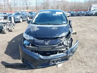 2015 Honda Fit LX z VIN 3HGGK5H51FM775176, wystawiony jako IAAI lot #41690648 z przebiegiem 49 979 mil mil oraz . Historia ofert i sprzedaży dostępna na DreamBid. Obrazek 12.
