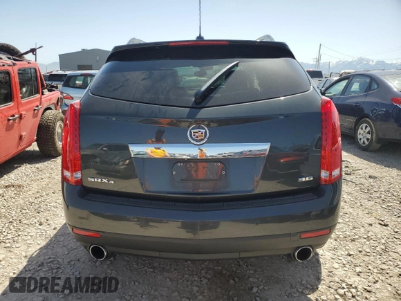 2015 Cadillac SRX Performance Collection with VIN 3GYFNFE31FS522178, listed as a Copart auction lot 55991465 with Not provided miles and Salvage title. Bid and sale history available at DreamBid. Image 6.