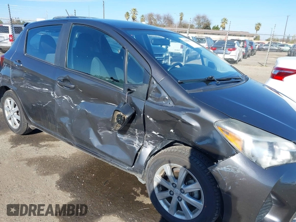 2015 Toyota Yaris L with VIN VNKKTUD34FA022251, listed as a IAAI auction lot 41435973 with 57,044 mi miles. Bid and sale history available at carsss.com. Image 6.